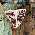 Small triangular brown sea pottery pendant 
