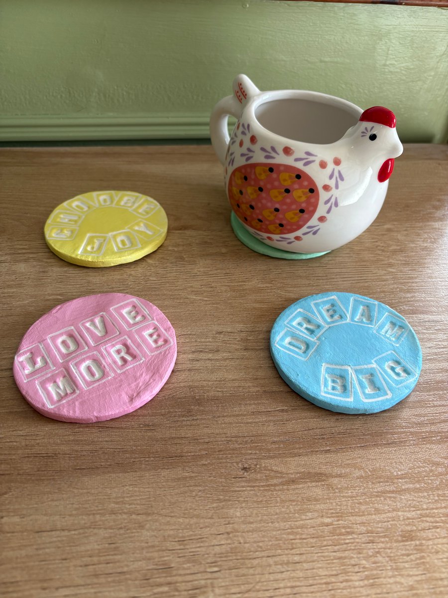 Coasters with positive phrases (set of 4)
