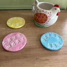 Coasters with positive phrases (set of 4)