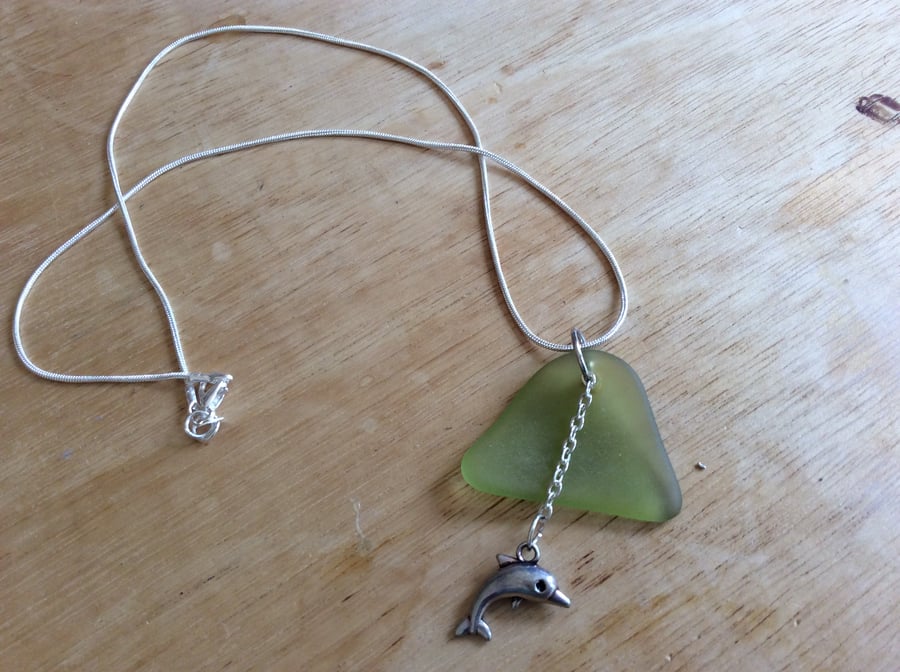 Sea glass with dolphin