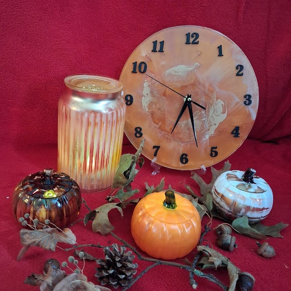 Handmade epoxy resin clock with hanger. Battery operated.