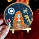 Painted wood slice with stand, meditating woman.