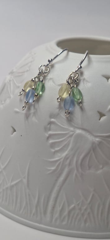 Delicate sterling silver and pastel blue, green and yellow pinch bead earrings. 