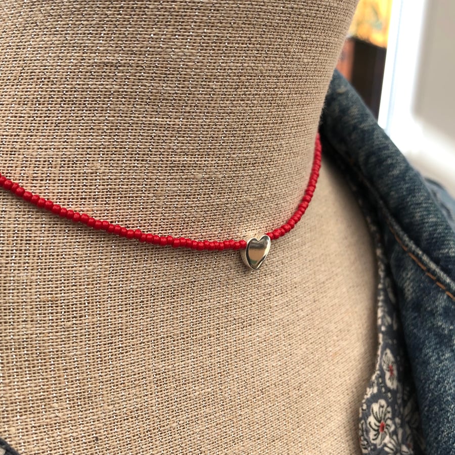 Red seed bead choker with sterling silver heart.