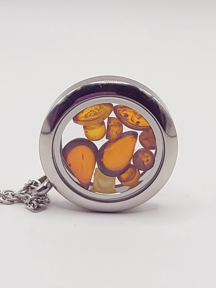Amber filled Window Locket Pendant. 