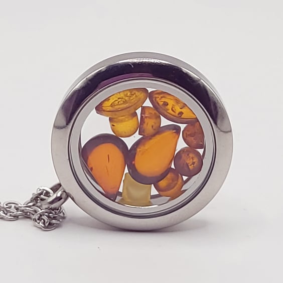 Amber filled Window Locket Pendant. 