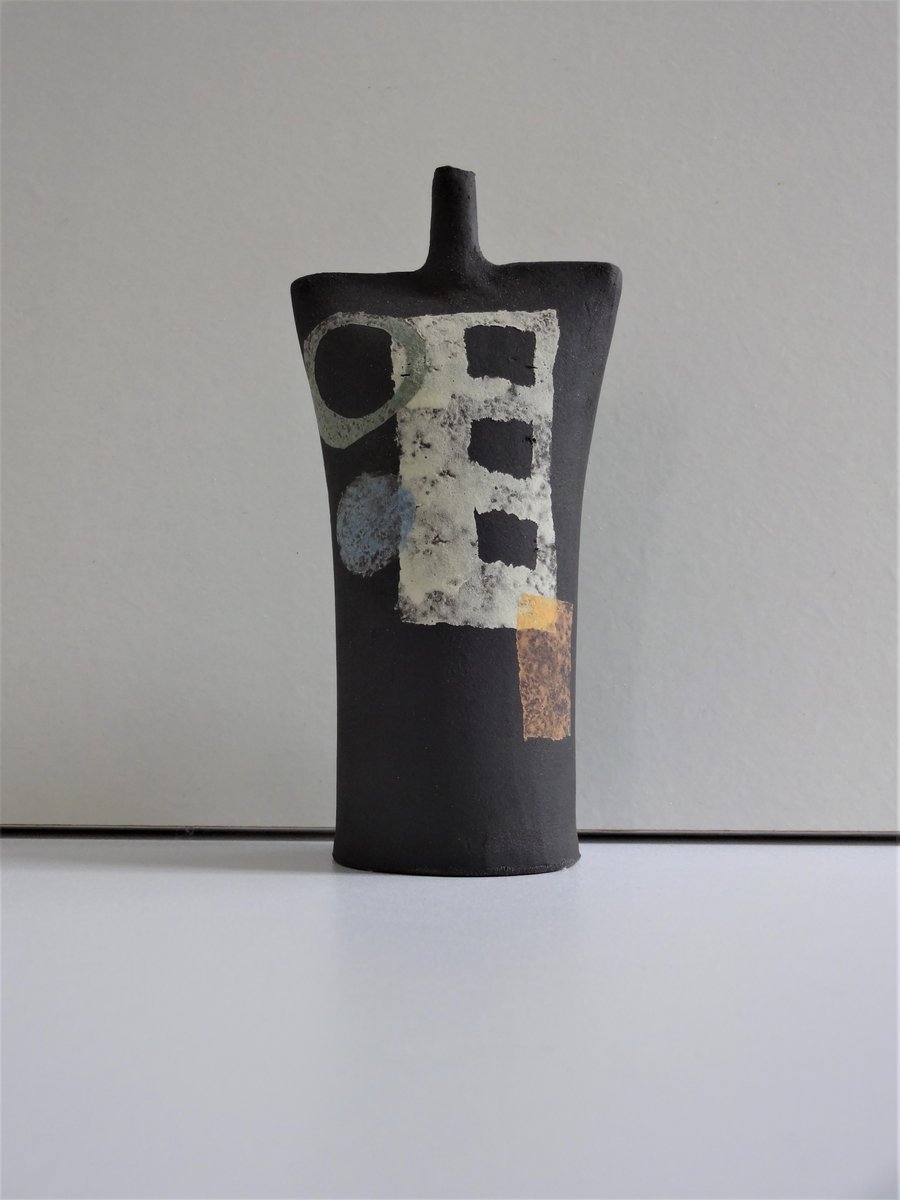 Clara.  Black ceramic abstract form.