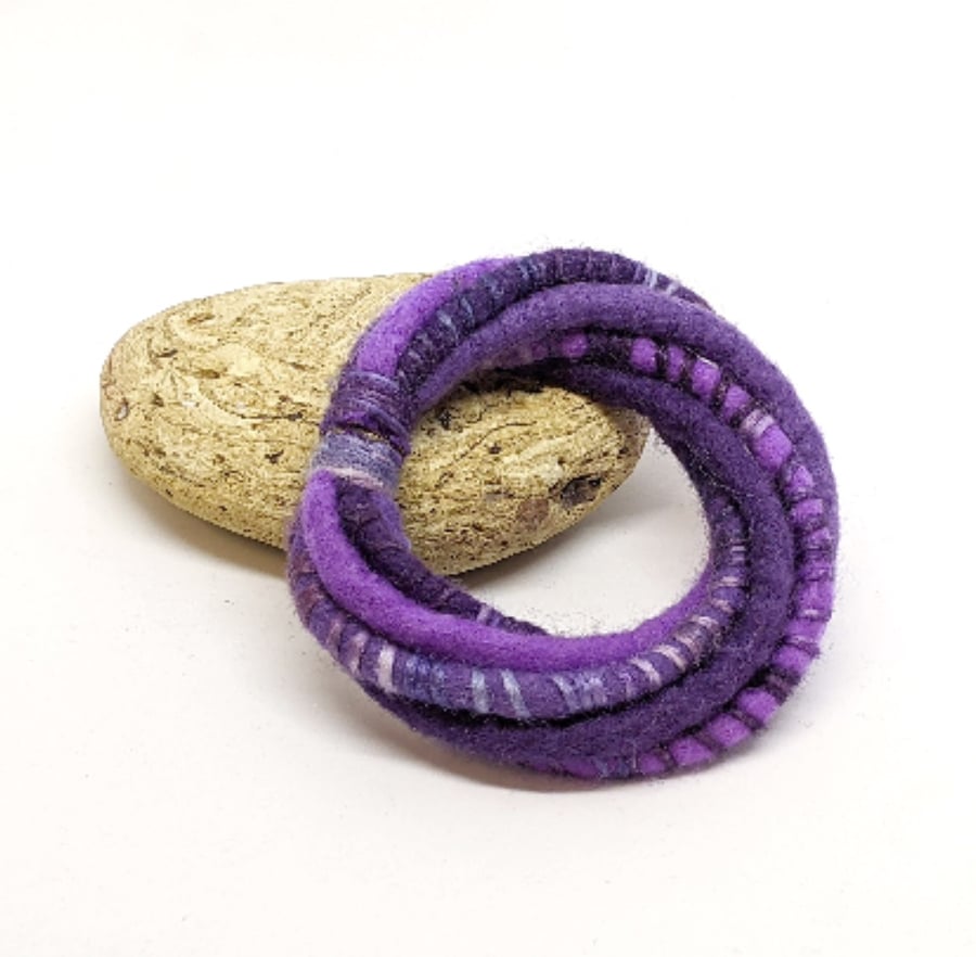 Felted cord bracelet in deep violet, purple and lilac shades