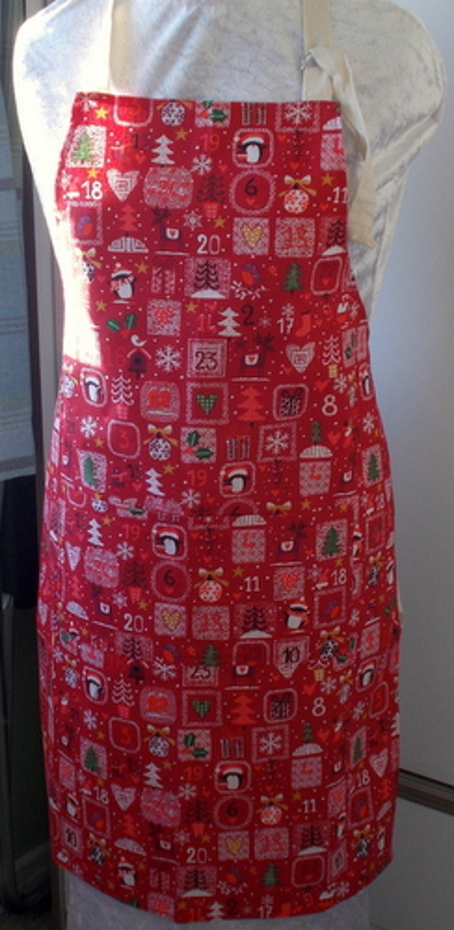 Festive hand made full apron with advent style print.
