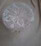 crochet Jug Cover with sparkly green beads