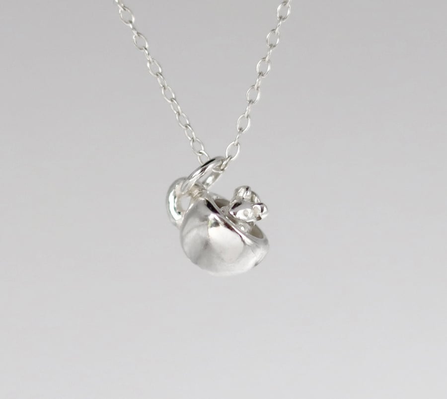 Little silver mouse in a teacup necklace