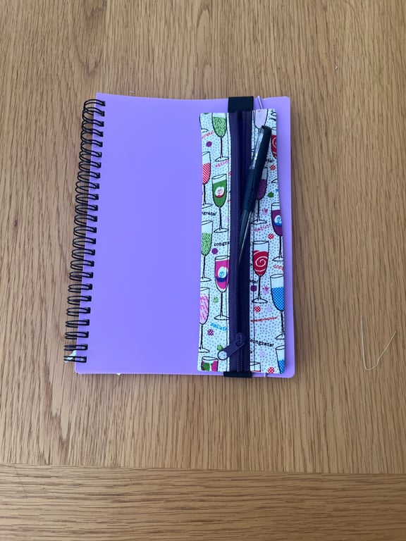 Pen or pencil holders for A5 notebooks or journals.
