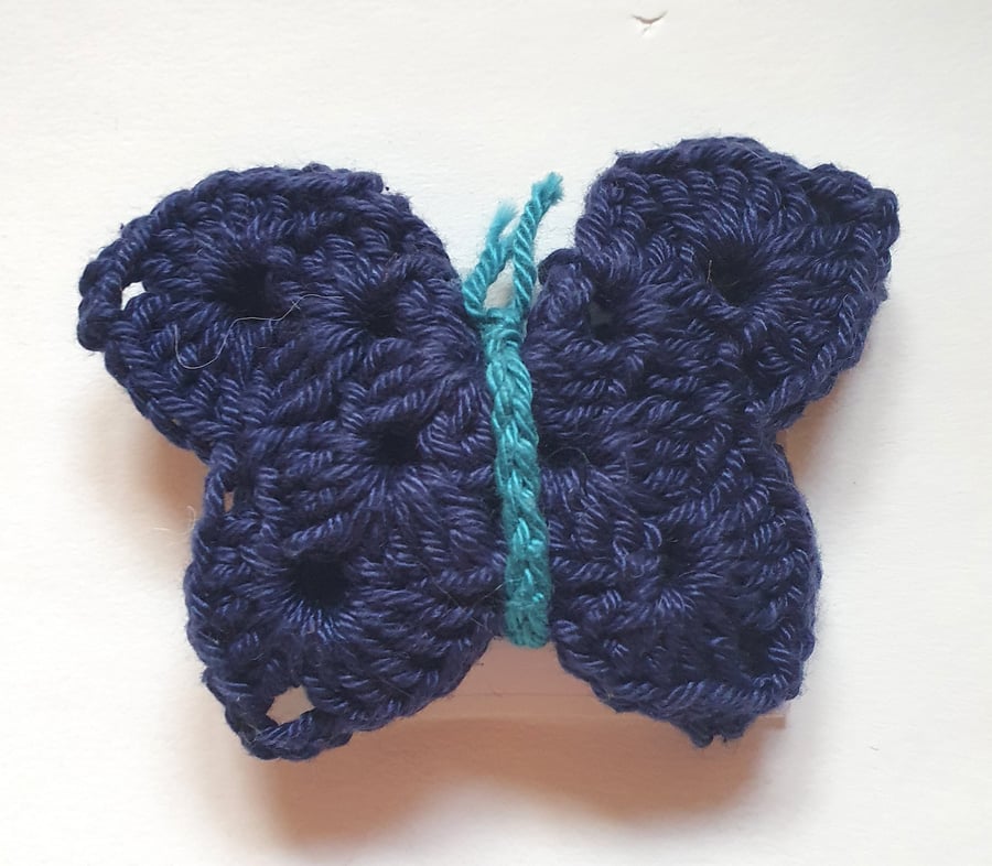 Crocheted cotton butterfly brooch