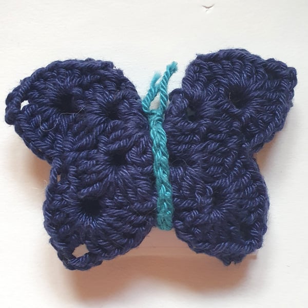 Crocheted cotton butterfly brooch