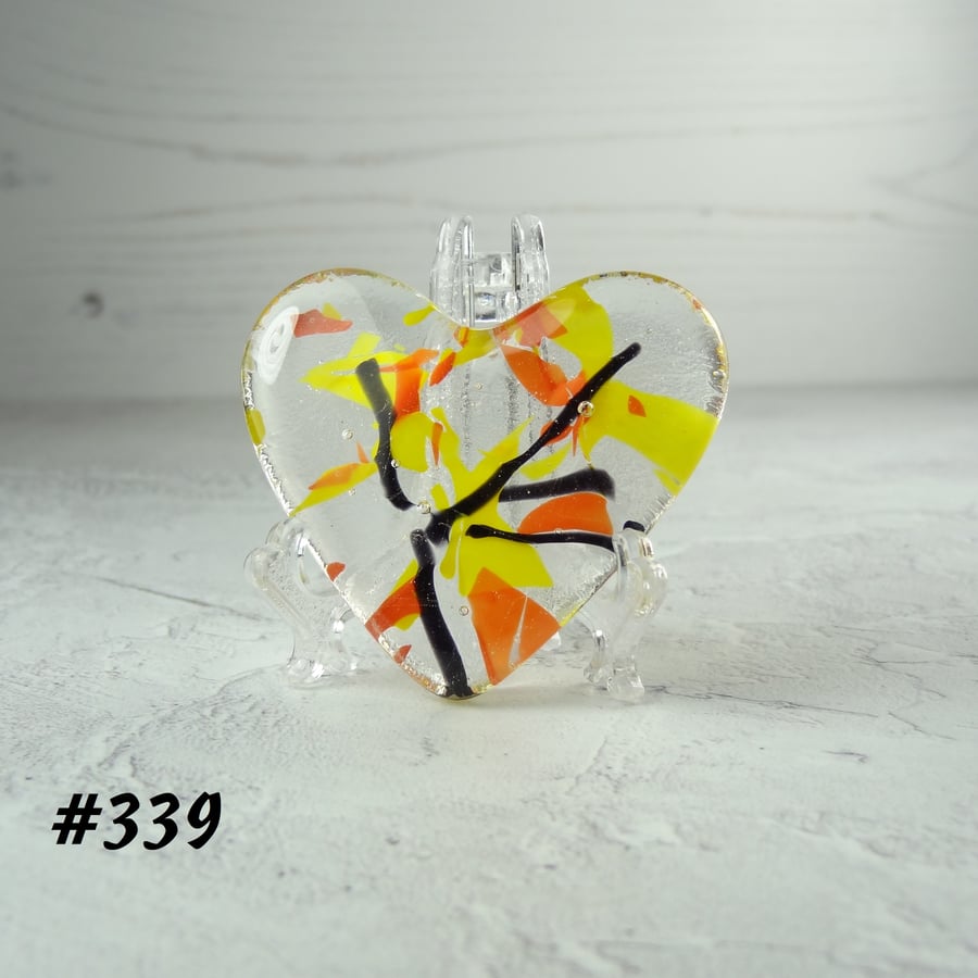 Yellow orange black heart fused glass pocket hug with stand 5x4.5cm (339)