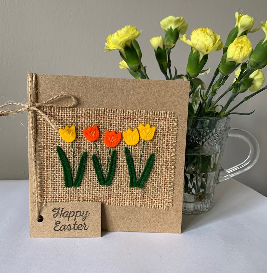 Easter greeting card with bright orange and yellow flowers. Handmade. Wool felt.