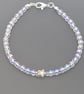 Metallic and clear seed bead star bracelet