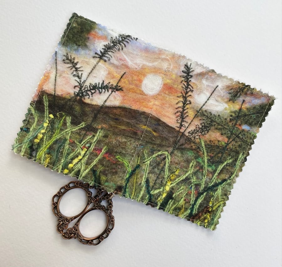 Sunset countryside sewing needle and pins case. 