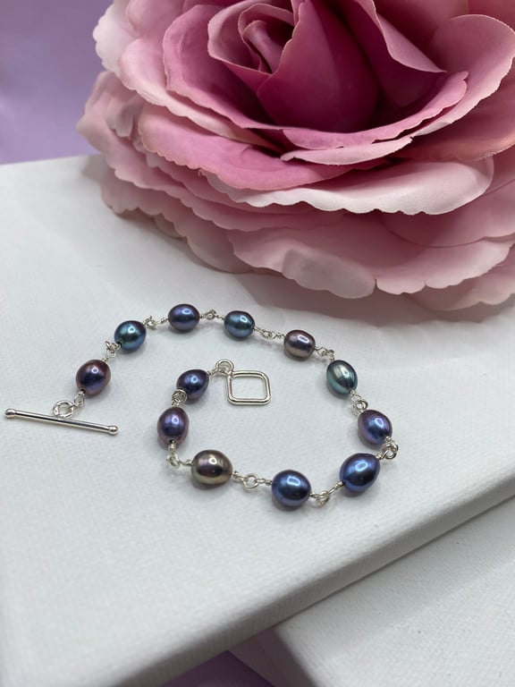 Peacock coloured freshwater nugget pearl bracelet with toggle clasp