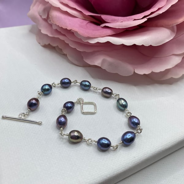Peacock coloured freshwater nugget pearl bracelet with toggle clasp