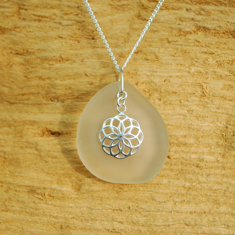 Celtic charm on beach glass pendant