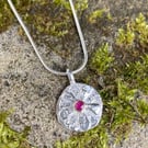 Silver and 18ct gold ruby Bloom pendant on chain