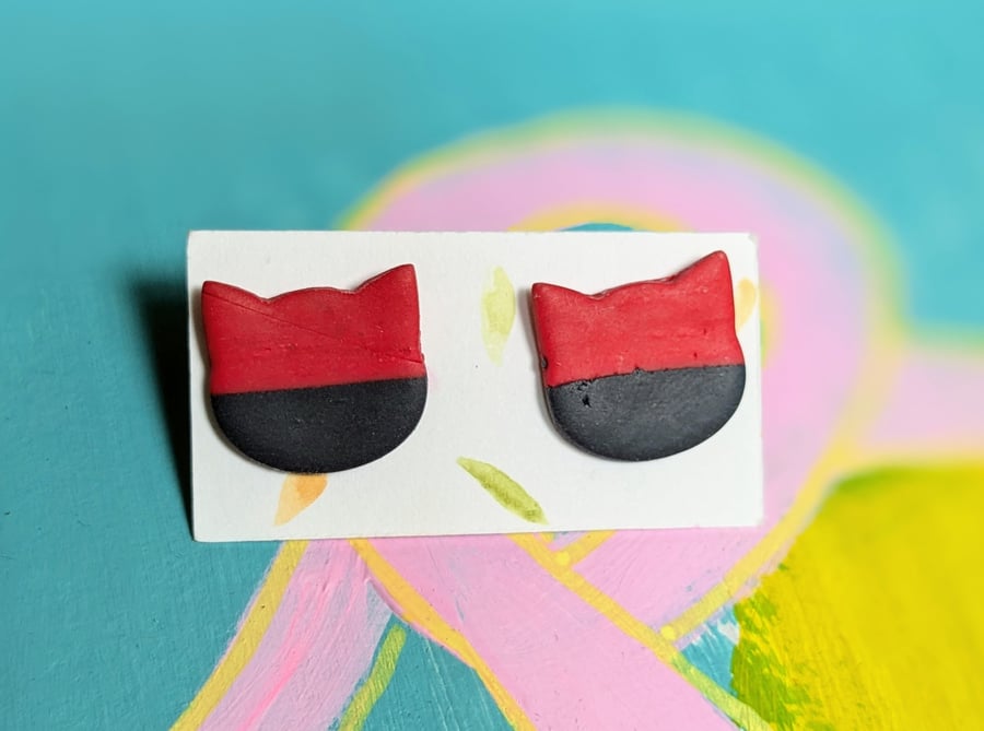 Cat earrings - large navy blue and red stud earrings in the shape of a cats head