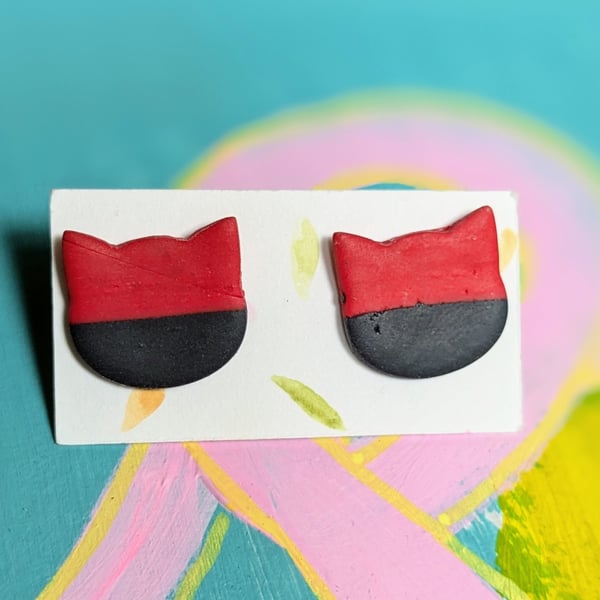 Cat earrings - large navy blue and red stud earrings in the shape of a cats head