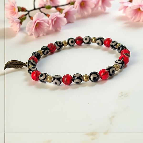 Red Howlite and Dzi Beaded Stretch Bracelet with Bronze Leaf Charm, 