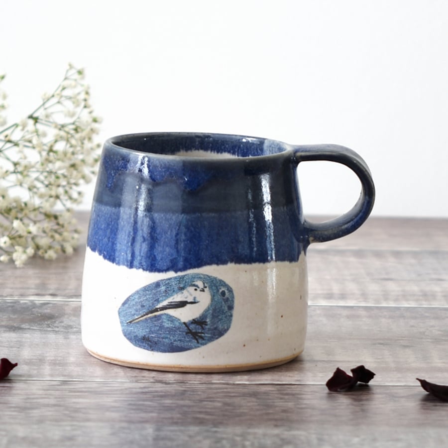 Blue and white ceramic mug with garden bird - handmade illustrated pottery