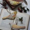 Recycled hanging fabric bird trio in Autumnal shades of yellow and orange 