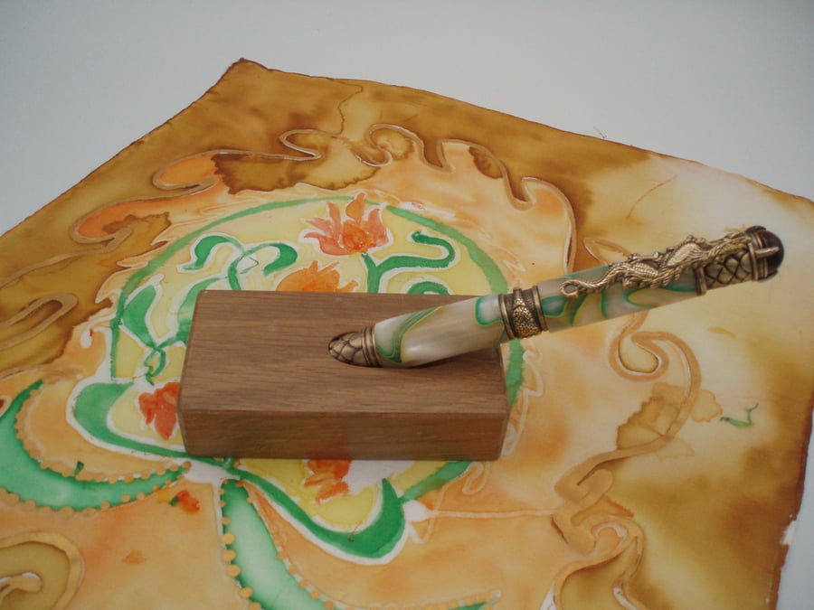 Green dragon pen in carved oak stand