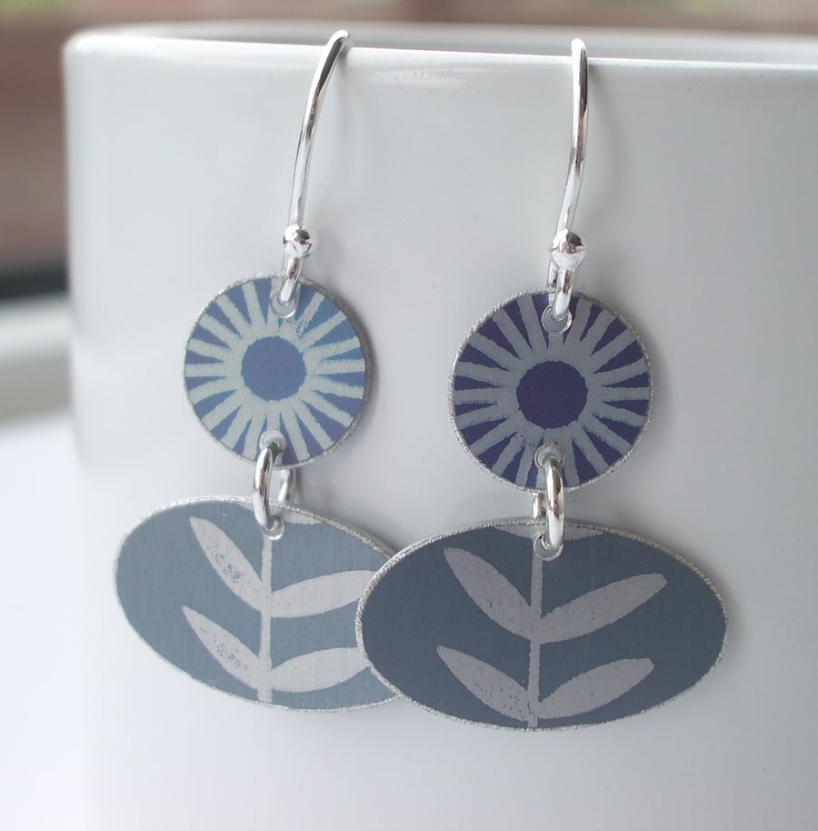 Flower and leaf earrings in purplish blue and grey