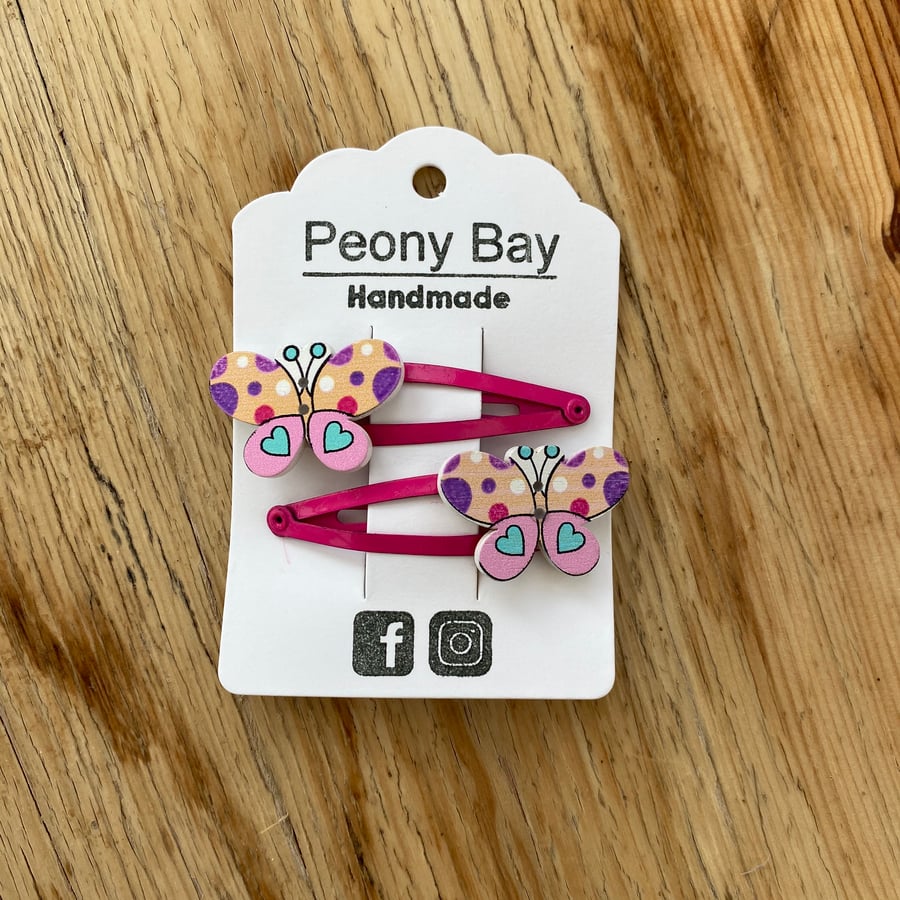Girl’s butterfly hair clips in pink