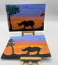 Original rhino paintings set of 2 wildlife sunset art with mini easels  - Image 1