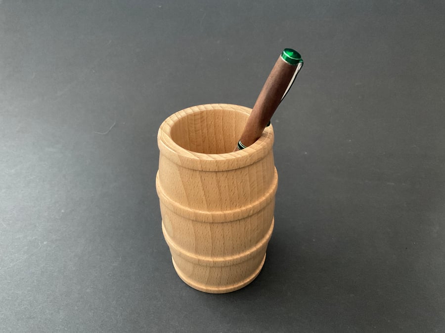 Wooden barrel shaped pen or pencil pot made from beech hardwood