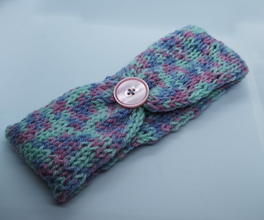 Handknitted pink, purple and mint earwarmer