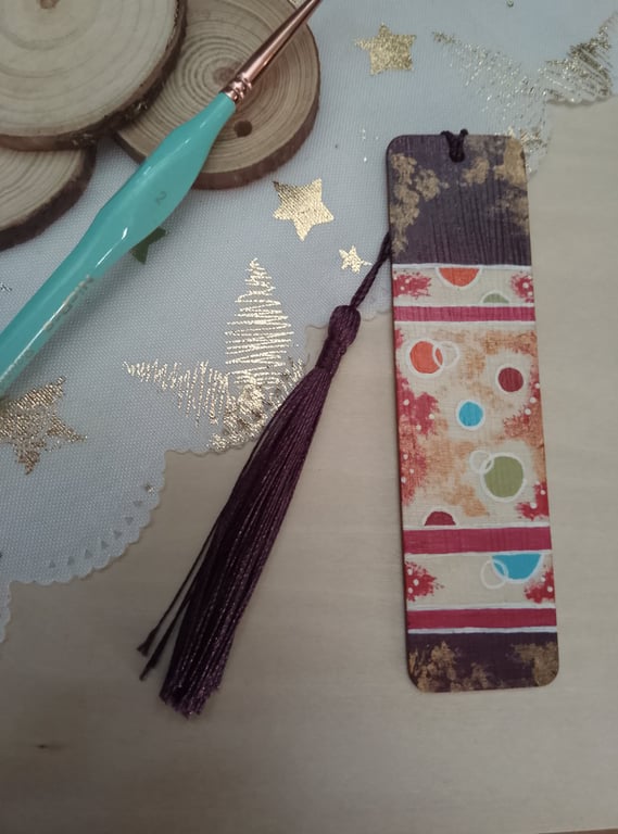 Colourful circular patterned wooden bookmark 
