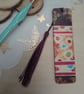 Colourful circular patterned wooden bookmark 