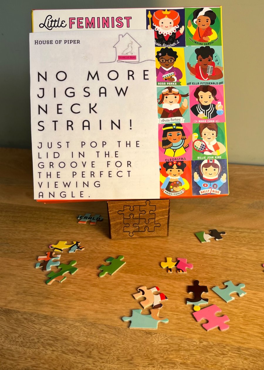Jigsaw lid holder 