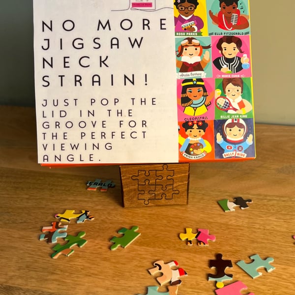 Jigsaw lid holder 