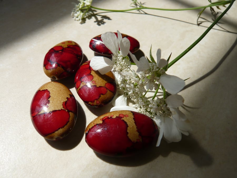 Oval Red and Gold Beads