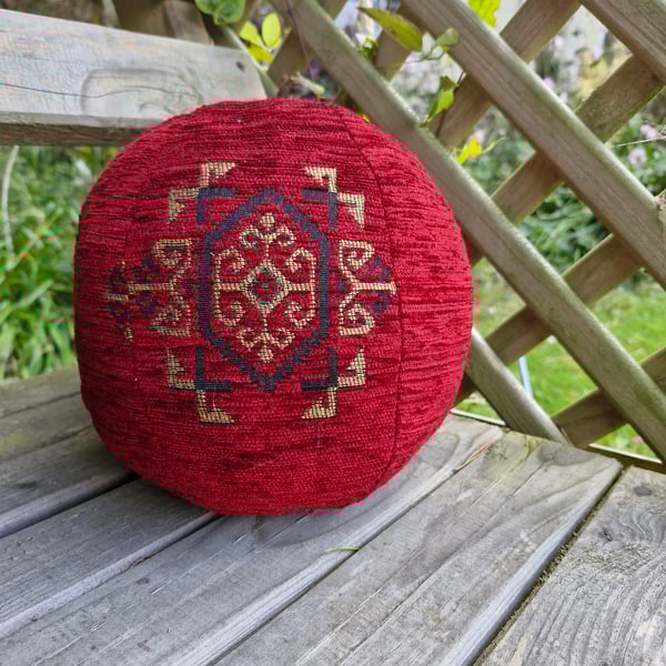 Large, decorative, red and gold fabric ball. Could be doorstop or decorative.