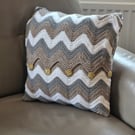 Hand crocheted cushion cover ,covering a 13 inch square cushion pad (supplied). 