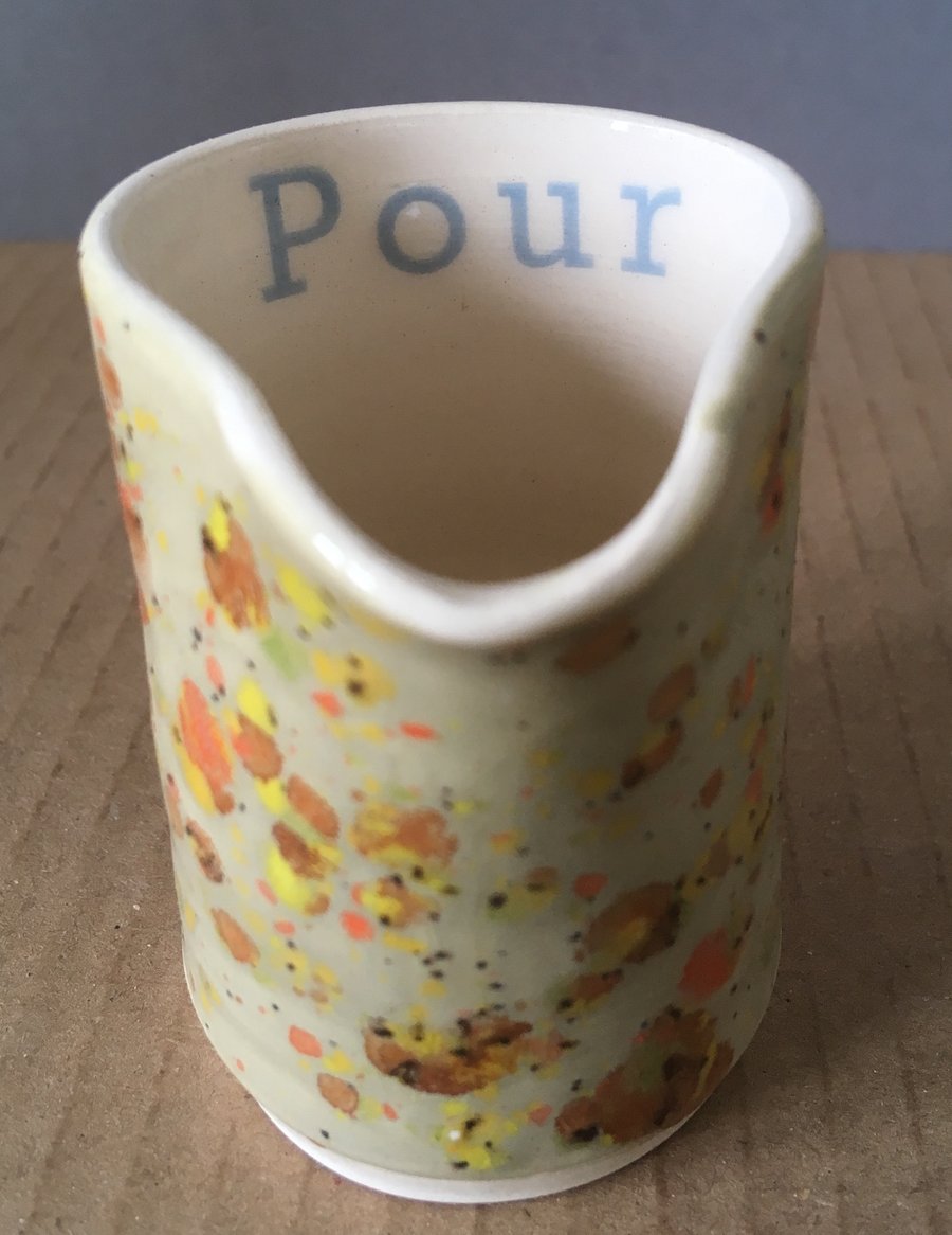 Pour. Pourer. Speckled glaze. Handmade. Pottery. 
