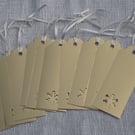 Bundle of 10 Christmas gift tags, gold foiled card with Snowflake aperture