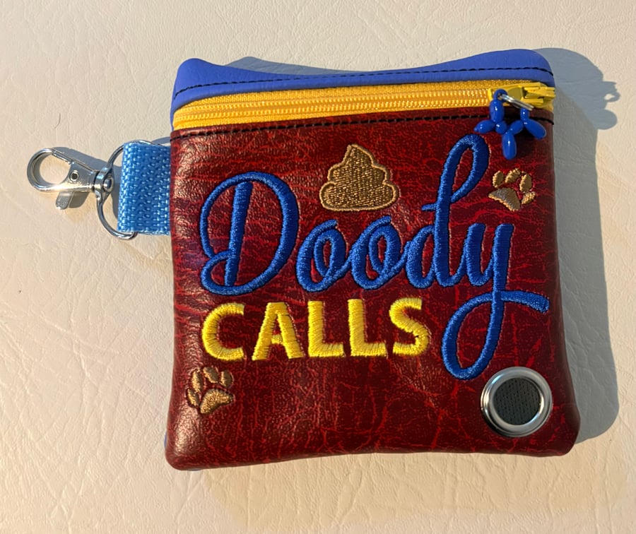 Doody Calls -  Embroidered Poo bag dispenser. 