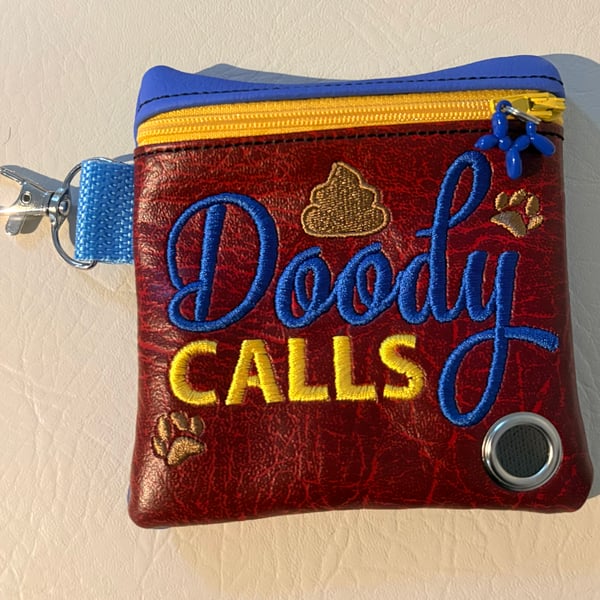 Doody Calls -  Embroidered Poo bag dispenser. 