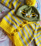 "Rouge Hive" Hand-Knitted Baby Cardigan and Hat.