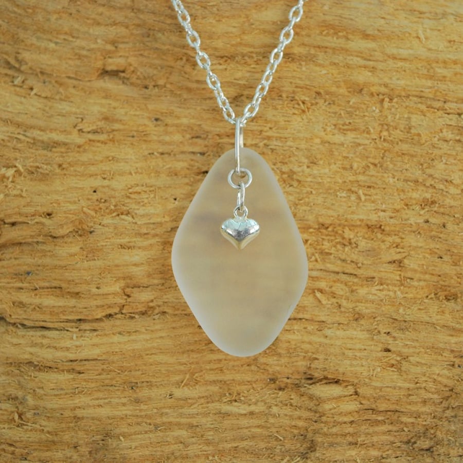 Beach glass pendant with heart charm